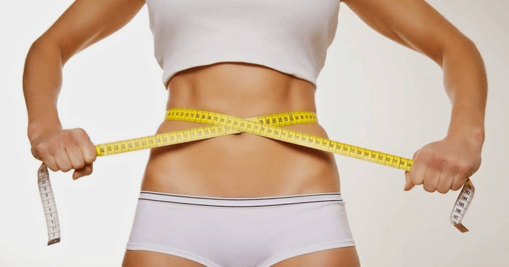 measuring the waist with a centimeter after losing weight